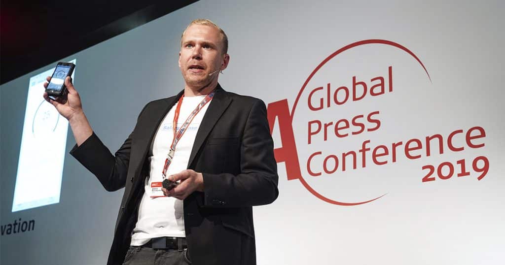 Safera's CEO Mikko Reinikainen presenting Sense stove guard at IFA2019 exhibition